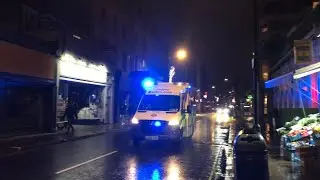 London Ambulance with lights on/no sirens responding to call at night