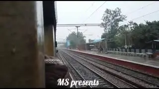 Honking BGKT WDG4 12675 with 60 wagons of BCNHL rake crossing my MEMU  in rainy weather.