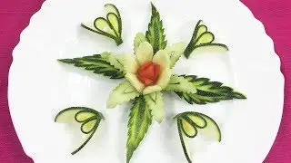 Very attractive zucchini and tomato flower carving garnish