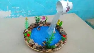 waterfall from hot glue gun and cup plate showpiece craft. fountain making, Gk craft.