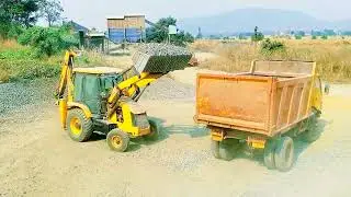 The JCB is loading stone aggregate into the dumper #excavator #jcb 
