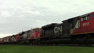 CN GP9 helping two ES44dc and an SD70m2