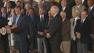 President Bush shares a laugh with Yogi Berra
