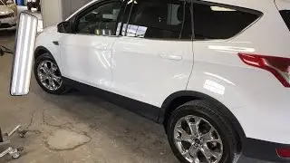 Вмятины на водительской двери Ford Escape 2016 года удалены методом беспокрасочного удаления вмятин | Тейлорвилл, Иллинойс