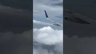 Flight window seat amazing view #clouds #bluesky #flight #travel #ytshorts #shortsviral #shorts