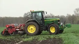 John Deere harrowing