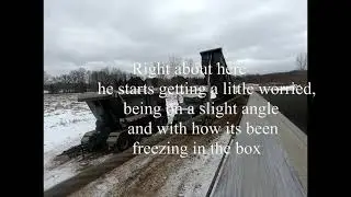 Rough winter day trucking, Gravel train stuck and load frozen in box.