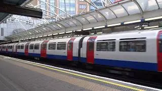 London Underground District and Piccadilly Line trains at Hammersmith