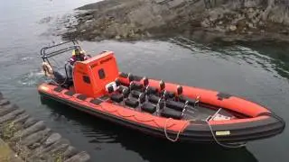 Seafari Rib boat arrives at Ellenabeitch Harbour Seil Island Scotland UK