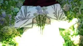 Dreaming lying over wet flowers