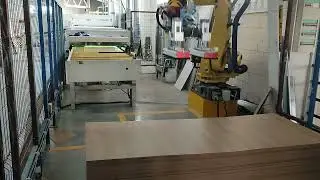 Robot Fanuc R2000 i- Apilando tableros de fibra
