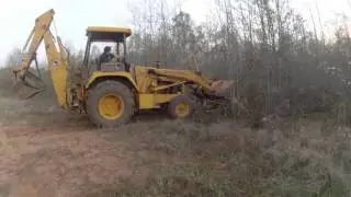 Ratchet Rake installed on John Deere 310D