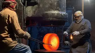 Inside a factory manufacturing a 128Kg hard metal round plate for industrial purposes #forging 