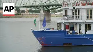 Tourists disembark boat after fatal collision on the Danube River in Hungary