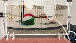 Dyed Water Moving Through a Sand Tank
