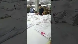 Factory work . Golden hands are moving for our country.