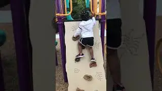 Kids climbing playground slide