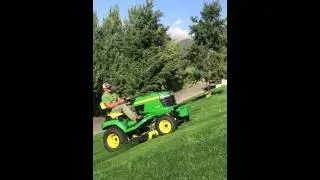 John Deere X758 Diesel Mowing Steep Hill