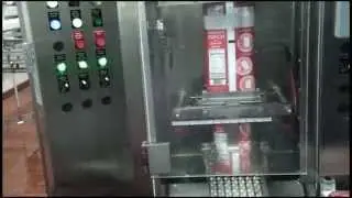 R&eacute;trofit machine &agrave; empocher le lait.
