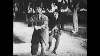 BETWEEN SHOWERS (1914) -- Charlie Chaplin, Ford Sterling, Chester Conklin