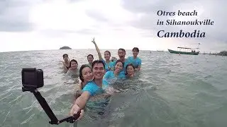 Beautiful girls swim and play at Otres beach in Sihanoukville Cambodia