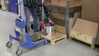 V-Block attachment on Pronomics lift and Drive, loading reels from the front.