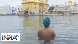Devotees take holy dip in sarovar at Golden Temple on Sikh New Year