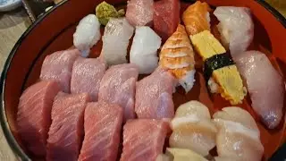 EAT SUSHI AT LOCAL RESTAURANT IN OSAKA JAPAN 