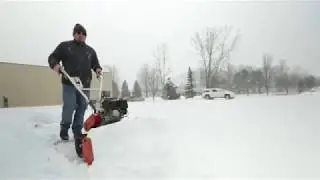 Clearing a Parking Lot with a Walk-Behind Snow Plow