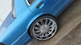 24 24s inch red sport 99 wheels tires on crown vic ford Victoria ulohos uloho rims Indianapolis tire