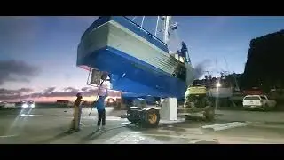  Welcome to Port Orford's New 50k ton crain. Lifting the F/V Aries on a fine Evening.