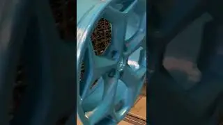 Grumpy blue powder coated ford snowflake wheels.