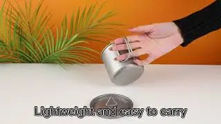 Titanium cup with folding handle
