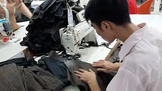 Trim on seam of join lapel to front panel SLSC