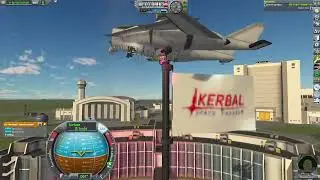 Planting a flag on the Kerbal space center flag pole.