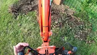 Digging out bush. Kubota bx25d