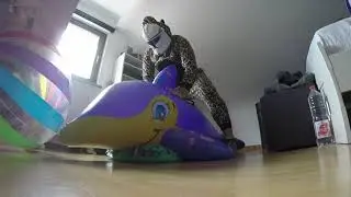 inflatable whale riding