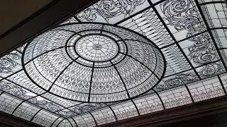 Residential stained and leaded glass dome ceiling with custom bevelled glass and crystal jewels