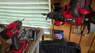 Rhino Multi Pro XA Gas driven post hole driver mounting bracket to the Honda GX 35 motor.