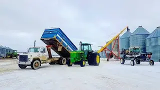 Selling canola, cleaning barley seed, drying soybeans and Antione helps make a video!!!