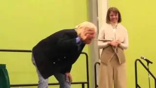 USF Staff member pulls sword from Sword Swallower Dan Meyer