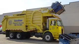 Sunshine Disposal - WhiteGMC / Heil Curved Shell Front Load Garbage Truck