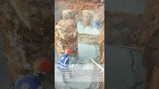 Demolition Precision: Workers Removing Fractured Pile Foundations