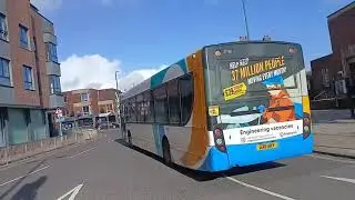 Enviro 300 operating a 55 to tangmere leaving Chichester bus station with tones 