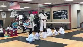 Sidekicks student turns in her good deeds and earns her white belt! 🤩