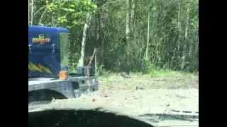 Tow truck gets stuck in mud!