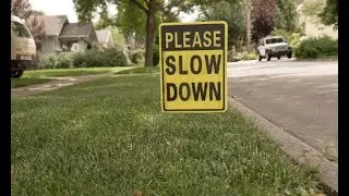 'Please slow down' signs are popping up in Dundee neighborhood