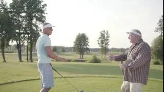 confident middle eastern golfer swinging and hitting golf ball on beautiful course an ol
