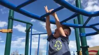 Alex can do the monkey bars!!