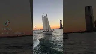 Cruising by Schooner Adirondack at sunset in New York Harbor